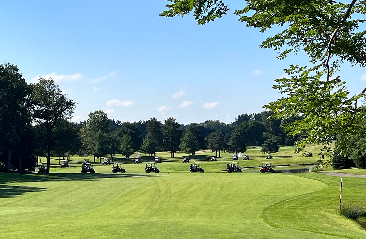 Golf carts rolling
